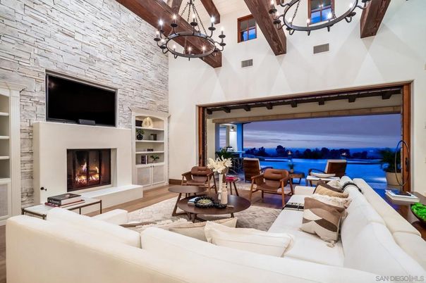 Chandelier, Fireplace, Interior, Living room, Stone Walls, Water, Wooden Beams, Wood Texture Flooring