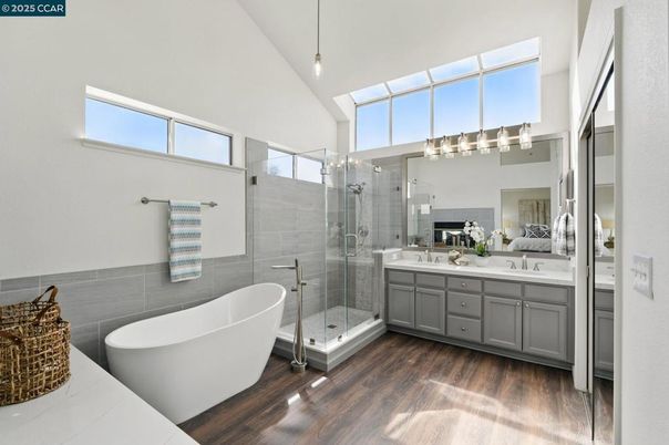 Bathroom, Dual Sink Vanities, Free Standing Baths, Glass Shower, Interior, Pendant Lights, Wood Texture Flooring