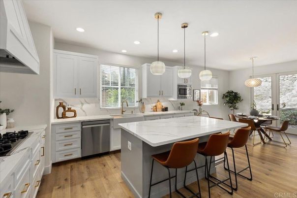 Dining room, Interior, Kitchen, Pendant Lights, Recessed Lighting, Stainless Steel Appliances, Wood Texture Flooring