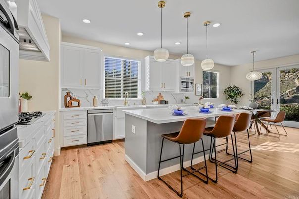 Dining room, Interior, Kitchen, Pendant Lights, Recessed Lighting, Stainless Steel Appliances, Wood Texture Flooring