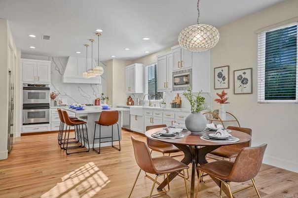 Dining room, Interior, Kitchen, Pendant Lights, Recessed Lighting, Stainless Steel Appliances, Wood Texture Flooring