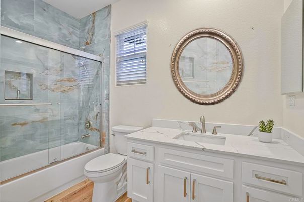 Bathroom, Glass Shower, Interior, Marble Walls, Wood Texture Flooring