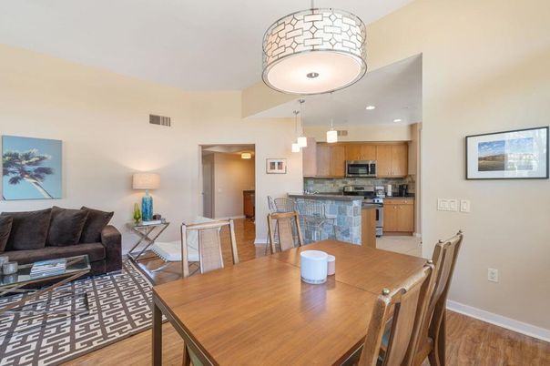 Dining room, Interior, Kitchen, Living room, Pendant Lights, Recessed Lighting, Stainless Steel Appliances, Wood Texture Flooring