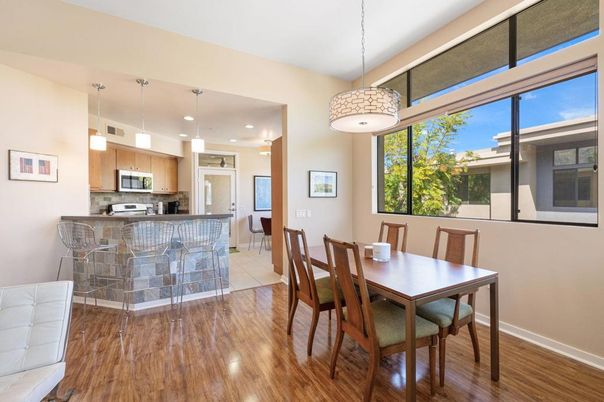 Dining room, Interior, Kitchen, Pendant Lights, Recessed Lighting, Stainless Steel Appliances, Wood Texture Flooring