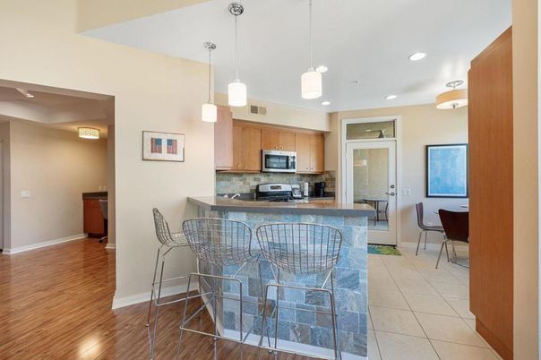 Dining room, Interior, Kitchen, Pendant Lights, Recessed Lighting, Stainless Steel Appliances, Wood Texture Flooring