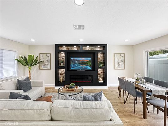 Dining room, Fireplace, Interior, Living room, Recessed Lighting, Wood Texture Flooring