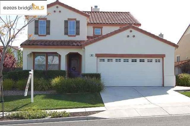 Attached, Exterior, Facade, Spanish Mediterranean