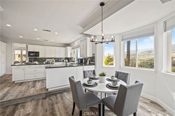 Dining room, Interior, Kitchen, Pendant Lights, Recessed Lighting, Stainless Steel Appliances, Wood Texture Flooring
