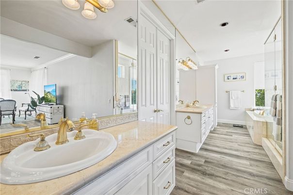 Bathroom, Dual Sink Vanities, Interior, Recessed Lighting, Wood Texture Flooring