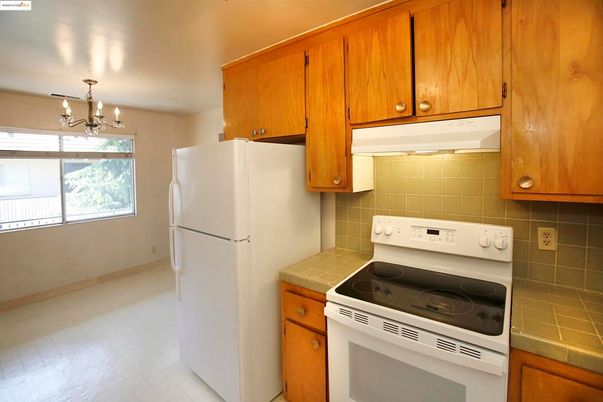 Chandelier, Interior, Kitchen, Tile Countertops, Wood Texture Flooring