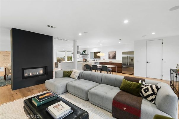 Dining room, Fireplace, Interior, Kitchen, Living room, Pendant Lights, Recessed Lighting, Stainless Steel Appliances, Wood Texture Flooring