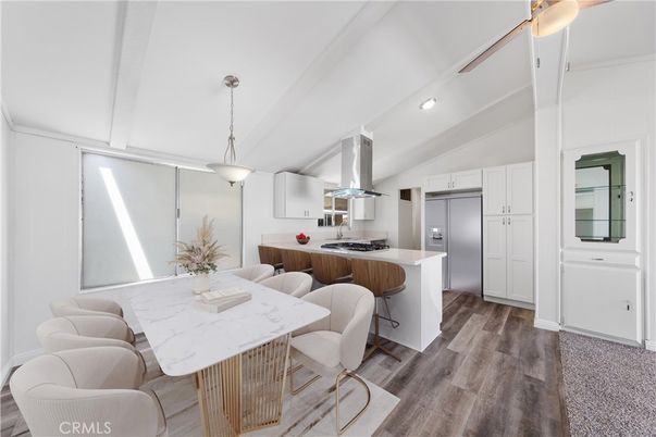 Dining room, Interior, Kitchen, Pendant Lights, Recessed Lighting, Stainless Steel Appliances, Wood Texture Flooring