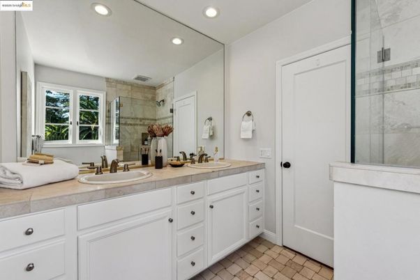 Bathroom, Dual Sink Vanities, Glass Shower, Interior, Recessed Lighting, Tile Countertops