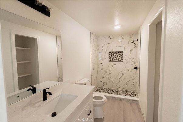 Bathroom, Interior, Marble Walls, Recessed Lighting, Wood Texture Flooring