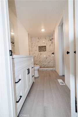Bathroom, Interior, Marble Walls, Recessed Lighting, Wood Texture Flooring