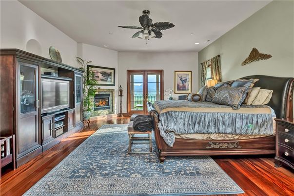Bedroom, Fireplace, Interior, Recessed Lighting, Wood Texture Flooring