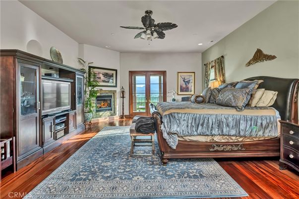 Bedroom, Fireplace, Interior, Recessed Lighting, Wood Texture Flooring