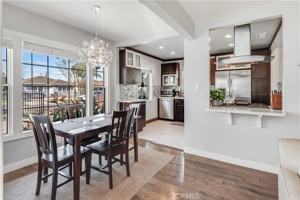 Dining room, Interior, Kitchen, Pendant Lights, Recessed Lighting, Stainless Steel Appliances, Wood Texture Flooring