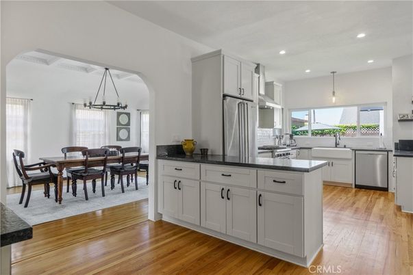 Dining room, Interior, Kitchen, Pendant Lights, Recessed Lighting, Stainless Steel Appliances, Wood Texture Flooring