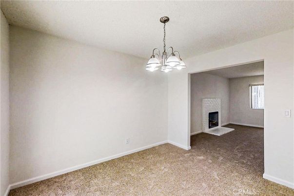Chandelier, Empty room, Fireplace, Interior