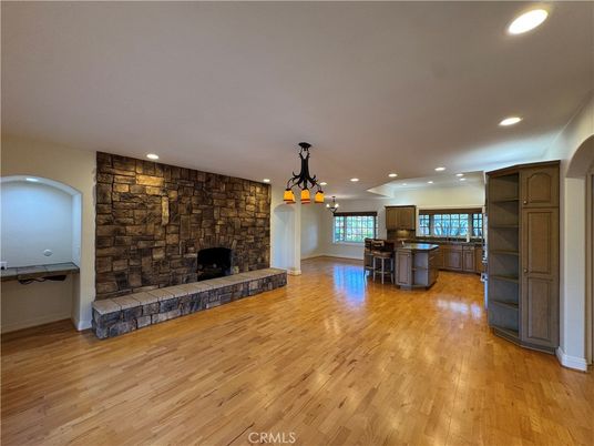 Fireplace, Interior, Kitchen, Pendant Lights, Recessed Lighting, Stone Walls, Wood Texture Flooring