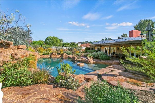 Exterior, Lake, Pool, Solar Panels