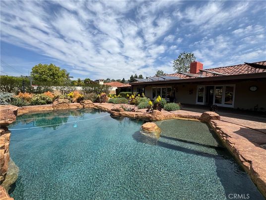 Exterior, Lake, Pool, Solar Panels