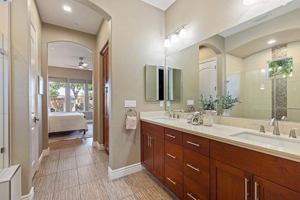 Bathroom, Dual Sink Vanities, Interior, Recessed Lighting, Wood Texture Flooring