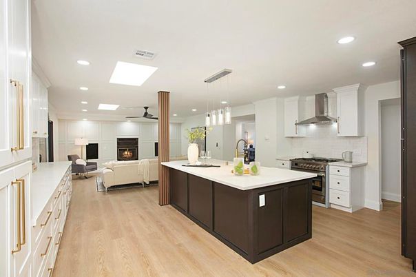 Fireplace, Interior, Kitchen, Living room, Pendant Lights, Recessed Lighting, Stainless Steel Appliances, Wood Texture Flooring