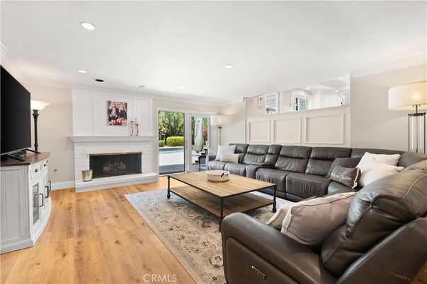 Fireplace, Interior, Living room, Recessed Lighting, Wood Texture Flooring