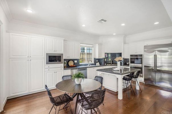 Dining room, Interior, Kitchen, Recessed Lighting, Stainless Steel Appliances, Wood Texture Flooring
