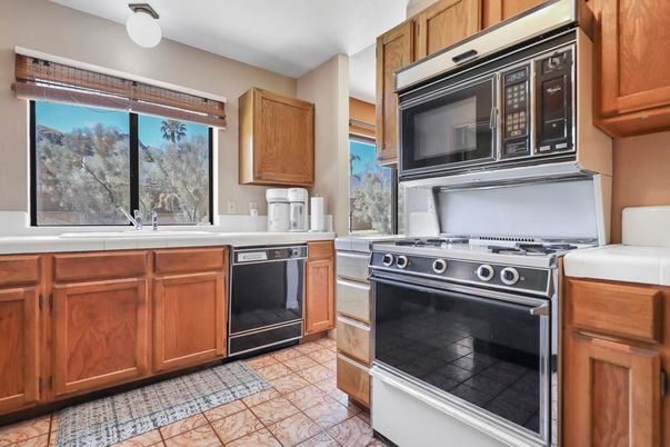 Interior, Kitchen, Stainless Steel Appliances, Tile Countertops