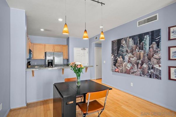 Dining room, Interior, Kitchen, Pendant Lights, Recessed Lighting, Stainless Steel Appliances, Wood Texture Flooring
