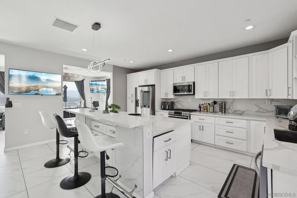 Interior, Kitchen, Marble, Marble Walls, Pendant Lights, Recessed Lighting, Stainless Steel Appliances