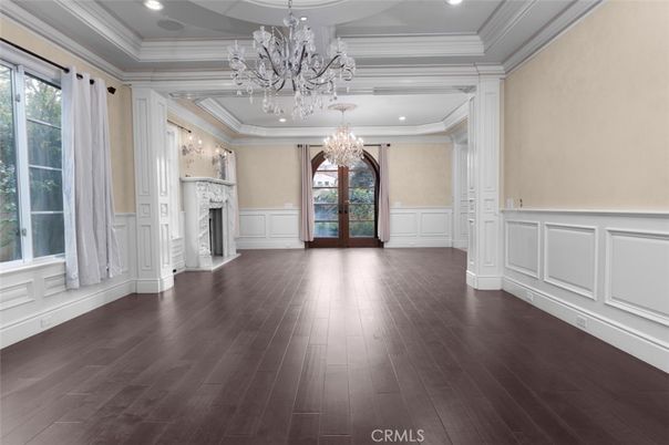 Chandelier, Empty room, Fireplace, Interior, Recessed Lighting, Wood Texture Flooring