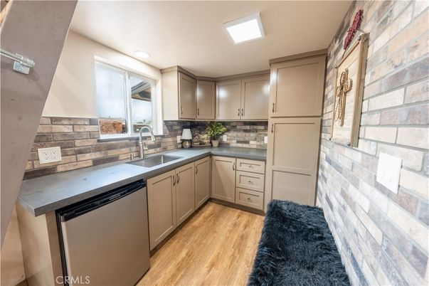 Interior, Kitchen, Recessed Lighting, Stone Walls, Wood Texture Flooring