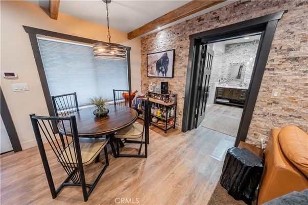 Dining room, Interior, Pendant Lights, Stone Walls, Wooden Beams, Wood Texture Flooring