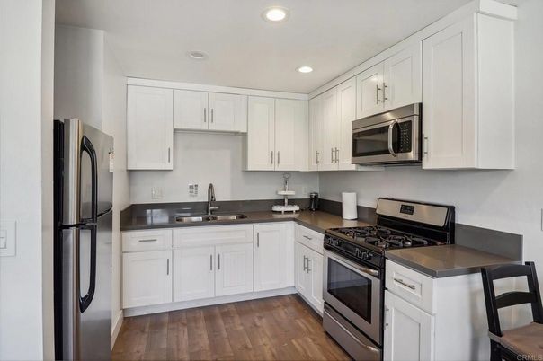 Interior, Kitchen, Recessed Lighting, Stainless Steel Appliances, Wood Texture Flooring