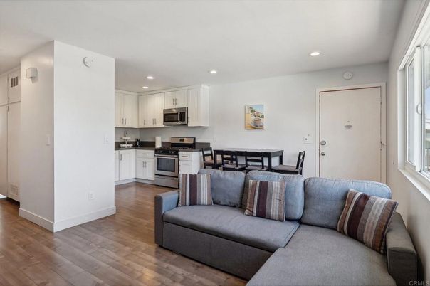 Dining room, Interior, Kitchen, Living room, Recessed Lighting, Stainless Steel Appliances, Wood Texture Flooring