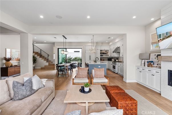 Dining room, Fireplace, Interior, Kitchen, Living room, Pendant Lights, Recessed Lighting, Stainless Steel Appliances, Wood Texture Flooring
