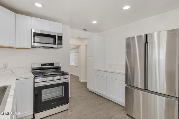 Interior, Kitchen, Recessed Lighting, Stainless Steel Appliances, Wood Texture Flooring
