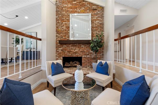 Fireplace, Interior, Living room, Recessed Lighting, Stone Walls, Wood Texture Flooring