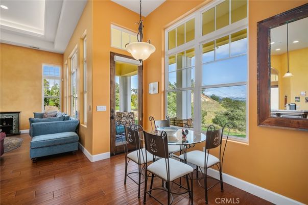 Dining room, Fireplace, Interior, Pendant Lights, Recessed Lighting, Wood Texture Flooring