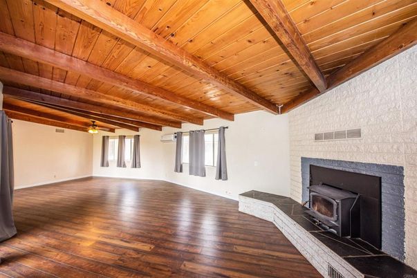 Empty room, Fireplace, Interior, Stone Walls, Wooden Beams, Wooden Ceilings, Wood Texture Flooring