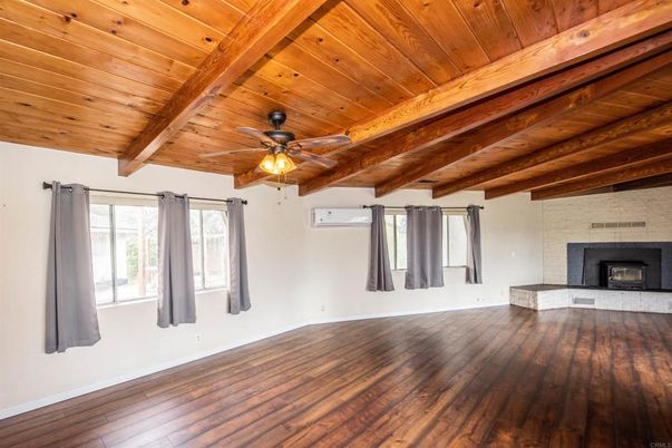 Empty room, Fireplace, Interior, Stone Walls, Wooden Beams, Wooden Ceilings, Wood Texture Flooring