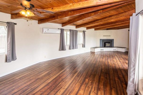 Empty room, Fireplace, Interior, Wooden Beams, Wooden Ceilings, Wood Texture Flooring