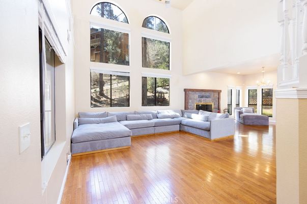 Chandelier, Fireplace, Interior, Living room, Recessed Lighting, Wood Texture Flooring
