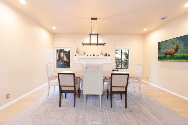 Dining room, Fireplace, Interior, Pendant Lights, Recessed Lighting, Wood Texture Flooring