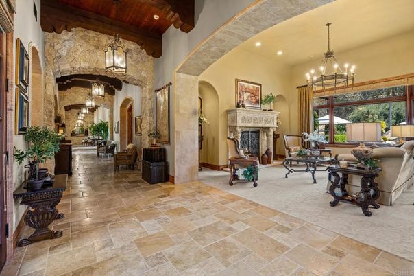 Chandelier, Fireplace, Interior, Living room, Pendant Lights, Recessed Lighting, Stone Walls, Wooden Beams, Wooden Ceilings