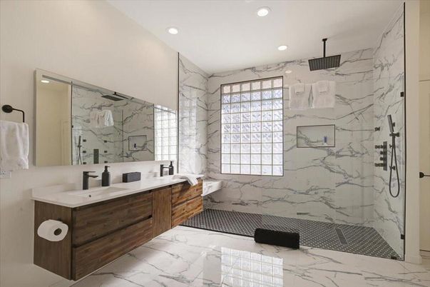Bathroom, Dual Sink Vanities, Glass Shower, Interior, Marble, Marble Walls, Recessed Lighting
